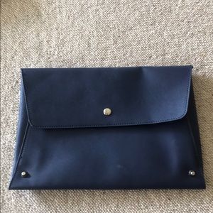 Blue faux leather clutch